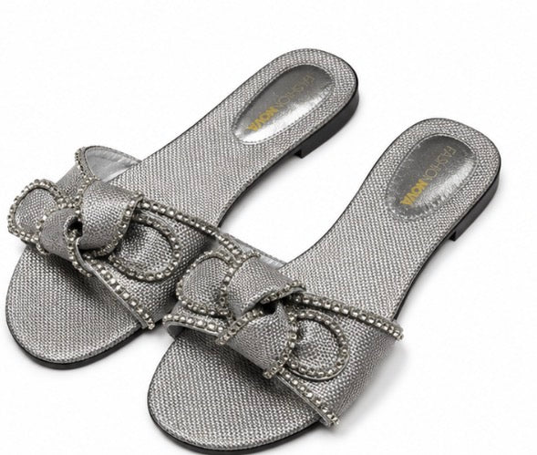 Fashion Nova women’s silver slide/mule sandals, size 11, with a large silver rhinestone bow