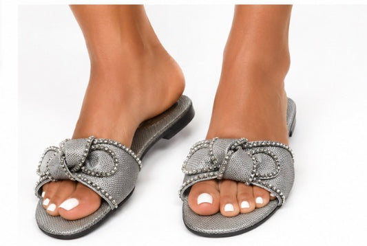 Fashion Nova women’s silver slide/mule sandals, size 11, with a large silver rhinestone bow